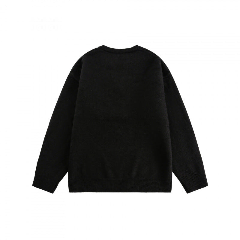 Unisex Boxy fine knit pullover with half Henley opening, round neck and ribbed finishes Chichicherry
