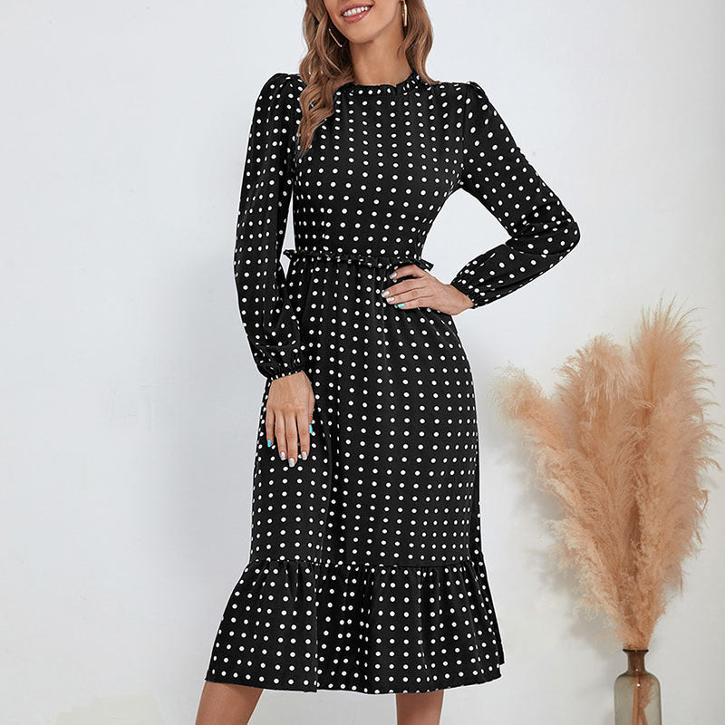 Women's midi dress in retro polka dot style with stand-up collar, tailored gathering, and ruffle trim