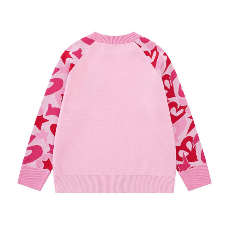 Women's knit sweater with raglan sleeves, statement jacquard sleeves, and ribbed hem Chichicherry