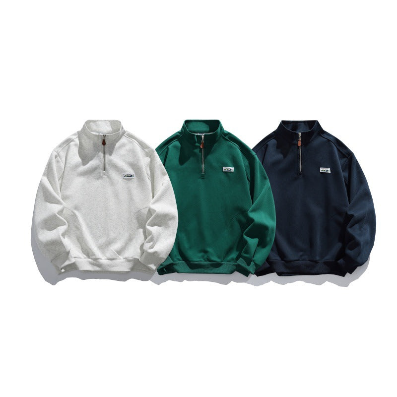 Unisex half-zip sweatshirt with stand-up collar, raglan sleeves, and minimalist chest patch Chichicherry