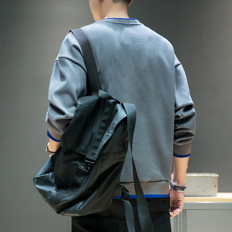 Men's relaxed sweatshirt with contrast piped cuffs and clean round neck Chichicherry