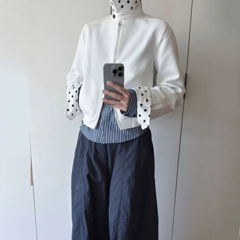 Women’s short-cut blouson jacket with stand-up collar, concealed zipper and contrasting polka dot patterned lining Chichicherry