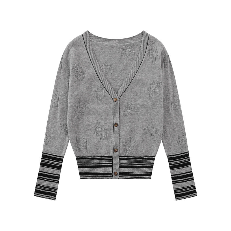 Ladies cardigan with V-neck, fine jacquard pattern and contrasting cuffs Chichicherry