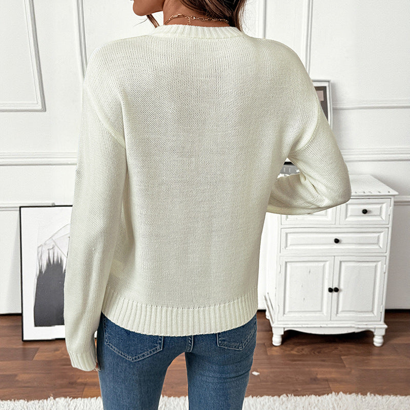 Ladies fine knit pullover with embroidered flower applications and round neckline Chichicherry