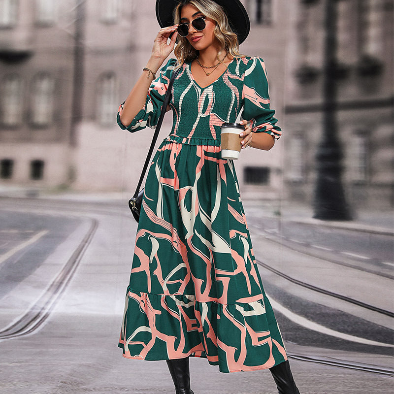 Women's midi dress with gathered smocked bodice, V-neckline and flared ruffle skirt Chichicherry