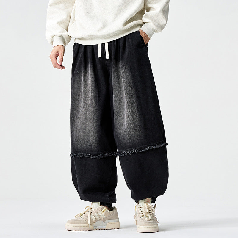 Men Wide-cut Baggy Denim Pants with Drawstring, Elastic Leg Openings and Fringed Detail Chichicherry