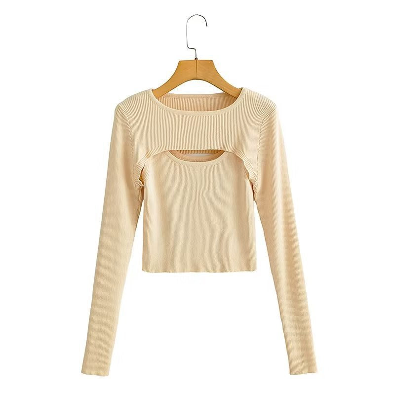 Women short cut ribbed knit top with asymmetric cut-outs and round neckline Chichicherry