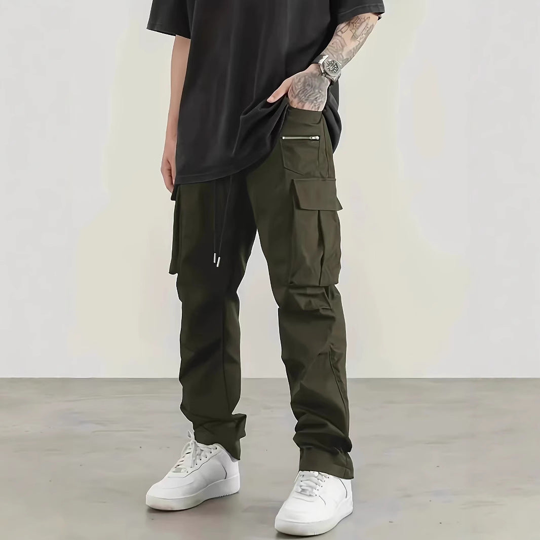 Men's wide technical cargo pants with large flap and zip pockets and drawstring waistband Chichicherry