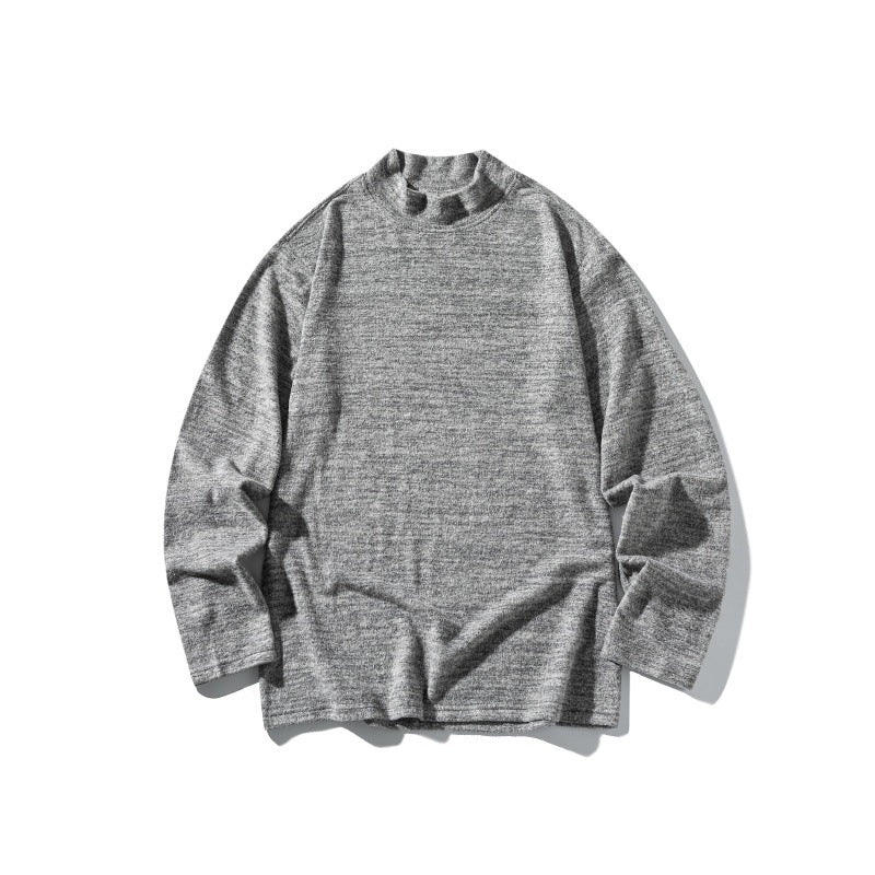 Unisex fine knit mock neck sweater with mottled structure and relaxed fit Chichicherry