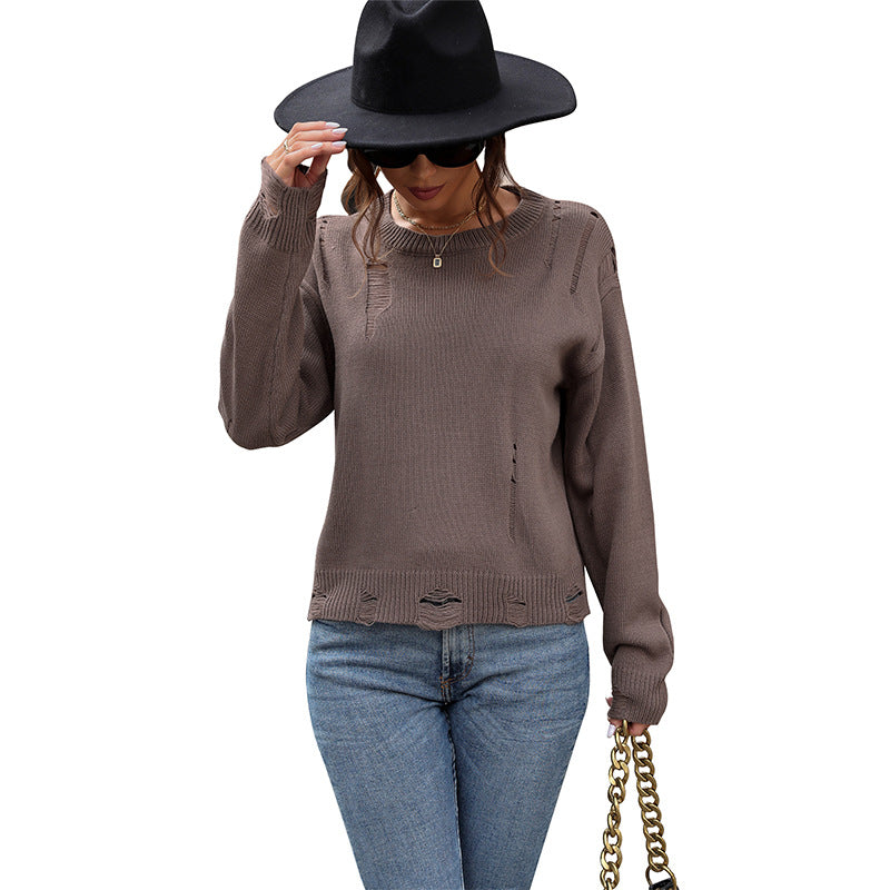 Women’s oversized knitted sweater in destroyed look with round neckline Chichicherry