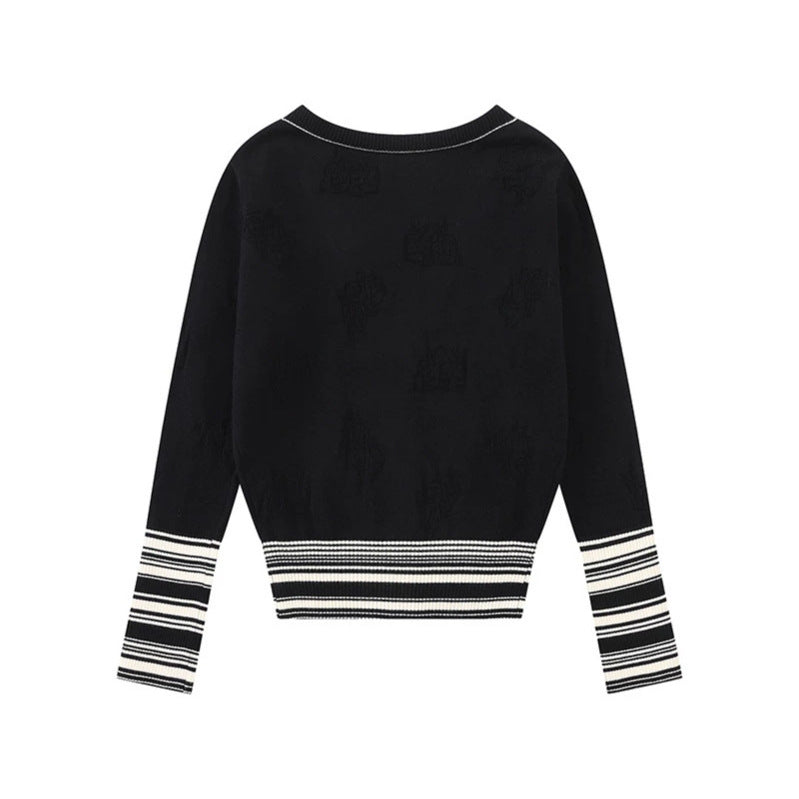 Ladies cardigan with V-neck, fine jacquard pattern and contrasting cuffs Chichicherry