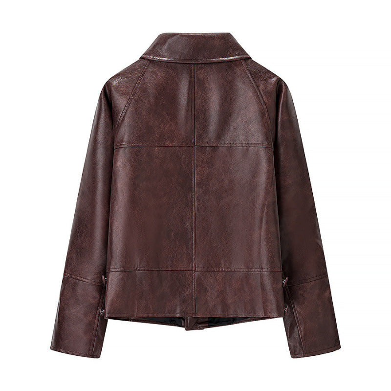 Women's short jacket made of faux leather in boxy cut with decorative seam details Chichicherry