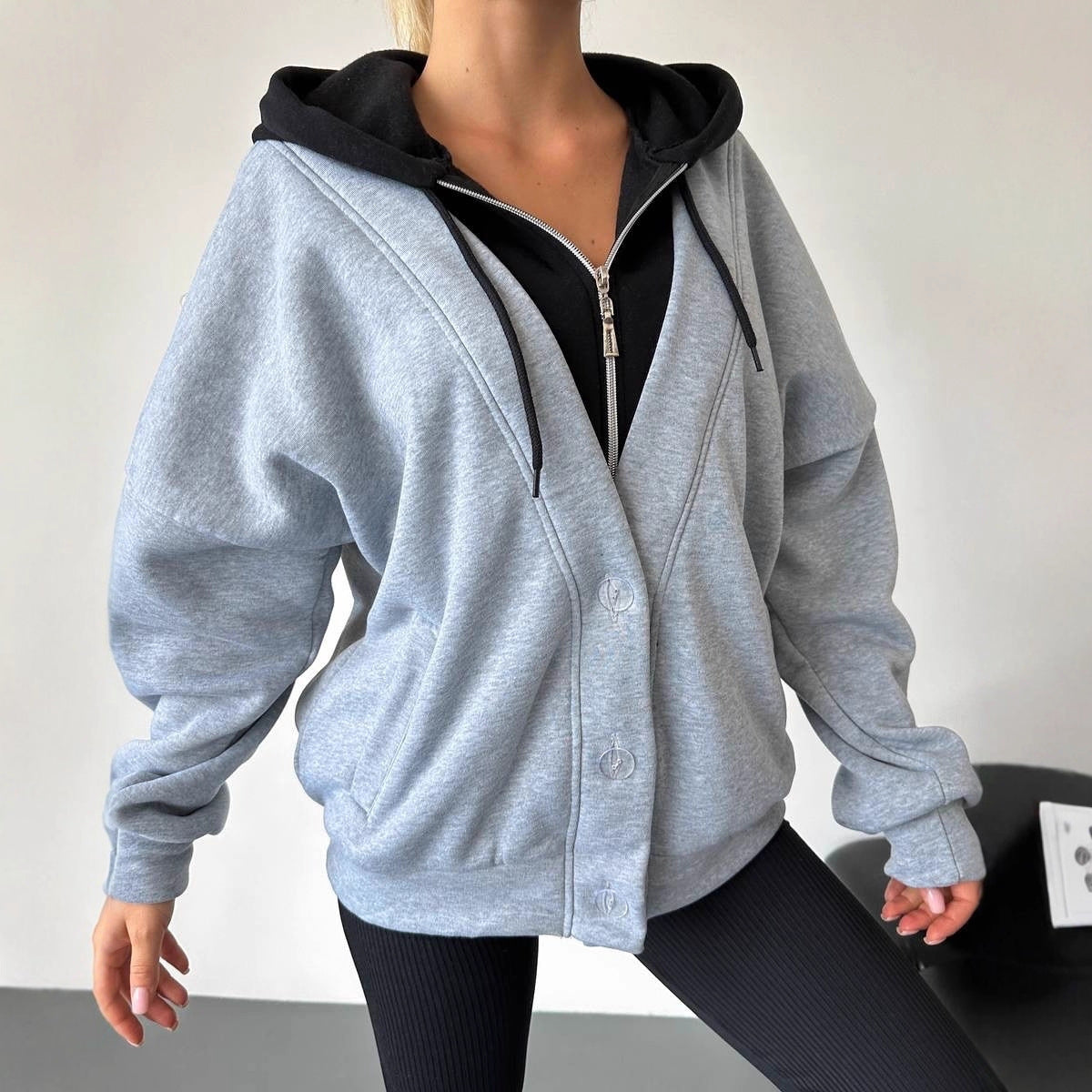 Damen Oversized Kapuzenjacke mit Druckknopfverschluss und Eingrifftaschen Chichicherry