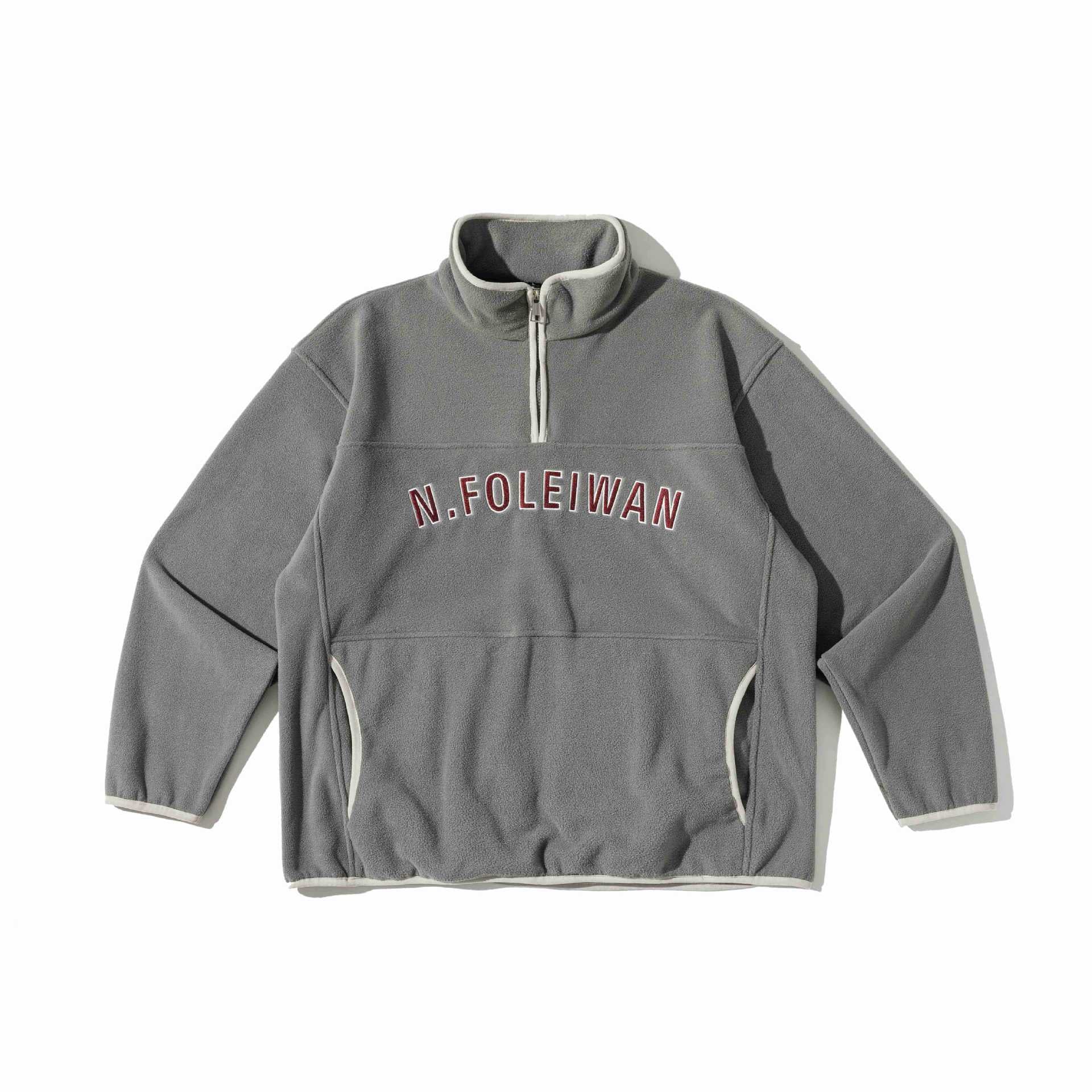 Unisex Fleece Pullover with half high zipper, kangaroo pocket and college style embroidery Chichicherry