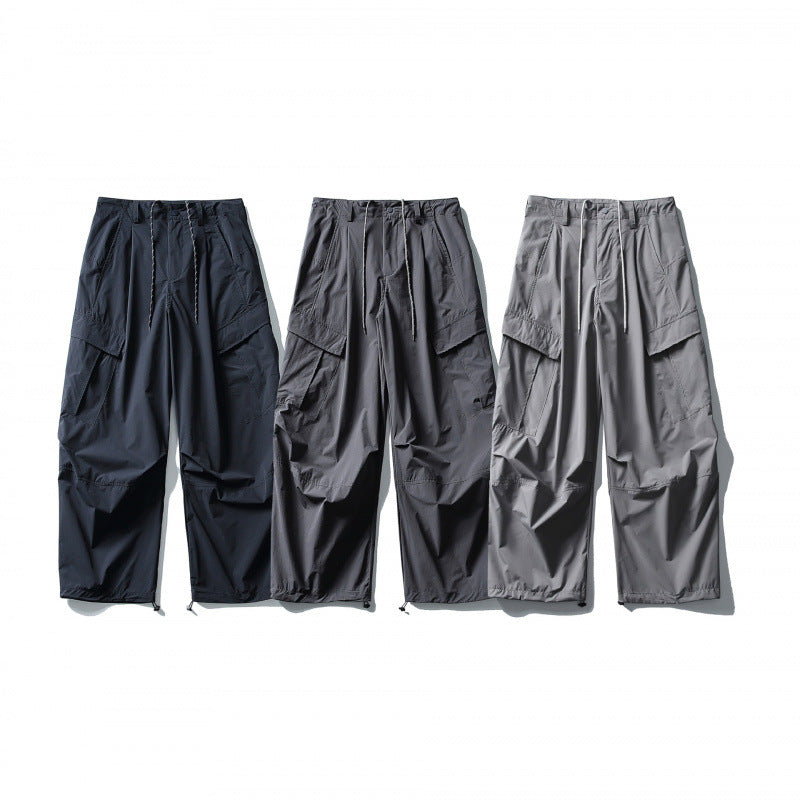 Men's loose technical cargo pants with drawstring waistband and adjustable leg closures Chichicherry