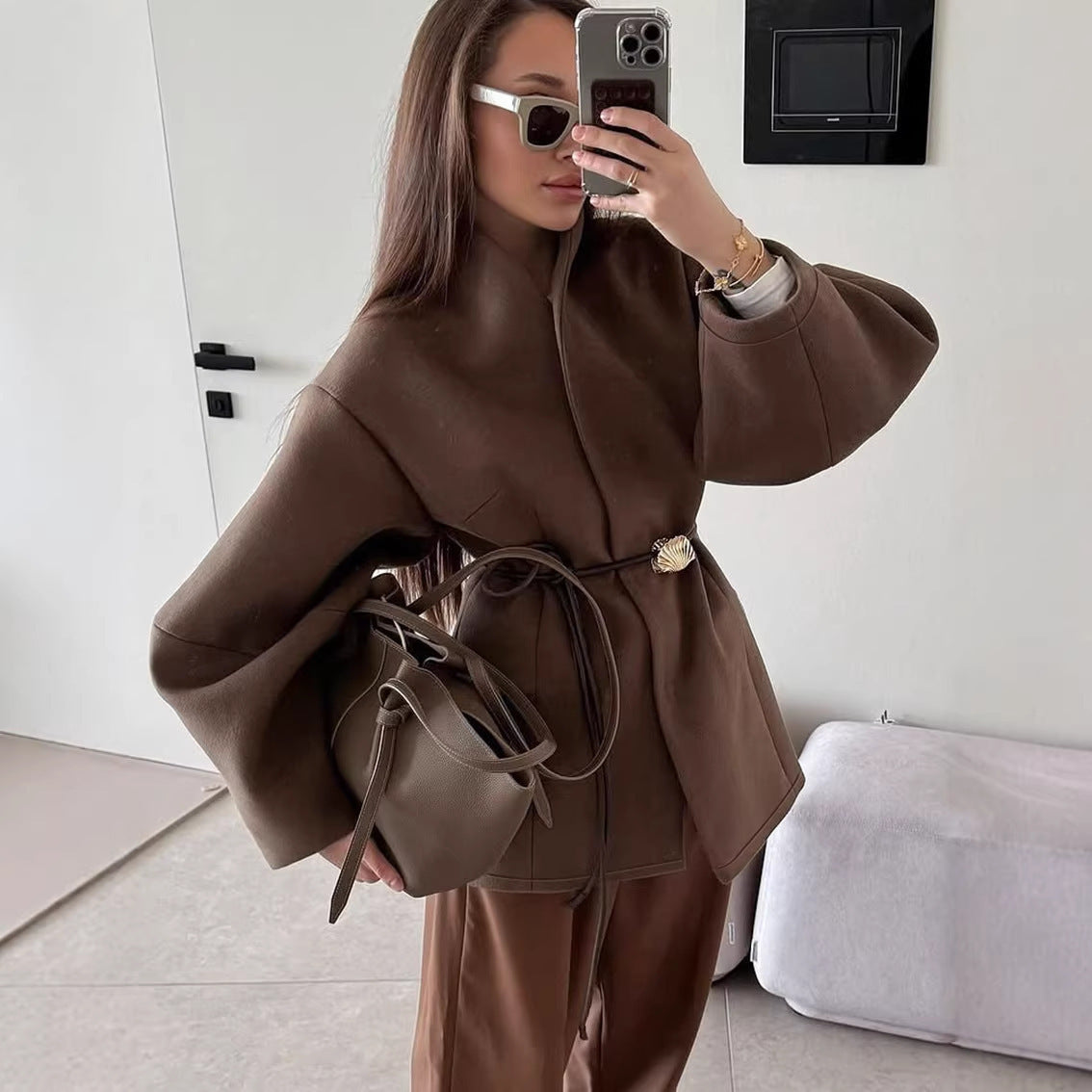 Women's short jacket with wrap closure, figure-hugging leather belt and shell clasp Chichicherry