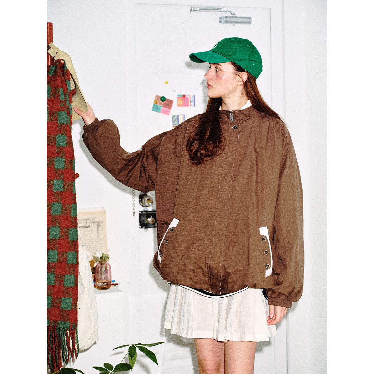 Unisex short-cut lightweight windbreaker jacket with standing collar, concealed zipper, and contrasting patch pockets Chichicherry