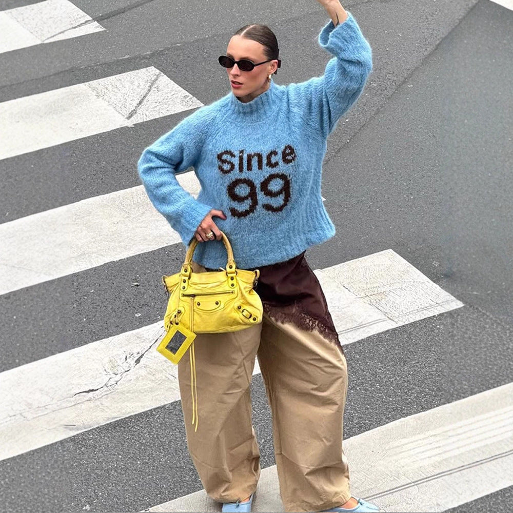 Women's cozy oversized mohair sweater with high roll neck and statement logo Chichicherry