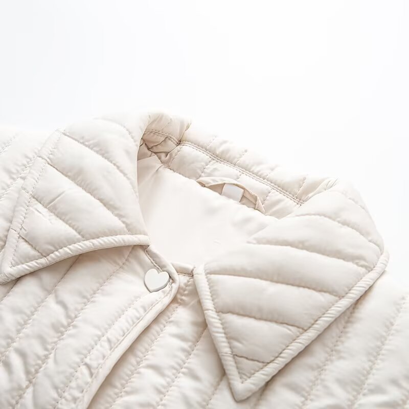 Women's short quilted jacket with vertical quilting, shirt collar and heart button placket Chichicherry