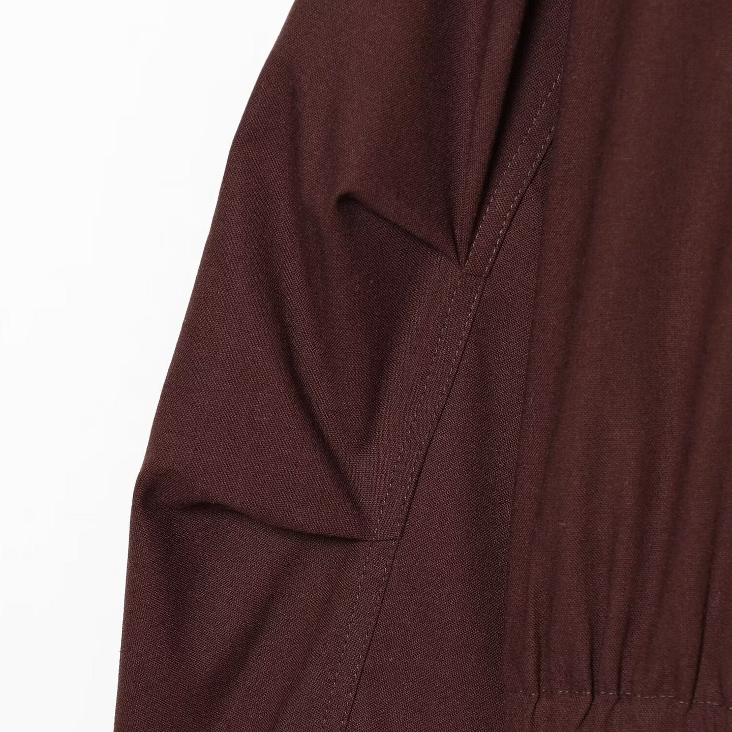 Women's short bomber-style jacket with high funnel collar, concealed zipper, and flap pockets Chichicherry