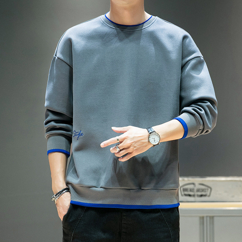 Men's relaxed sweatshirt with contrast piped cuffs and clean round neck Chichicherry