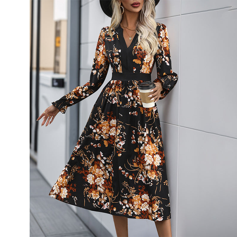 Women’s midi dress with fitted waist, V-neck, long sleeves, and floral all-over print Chichicherry