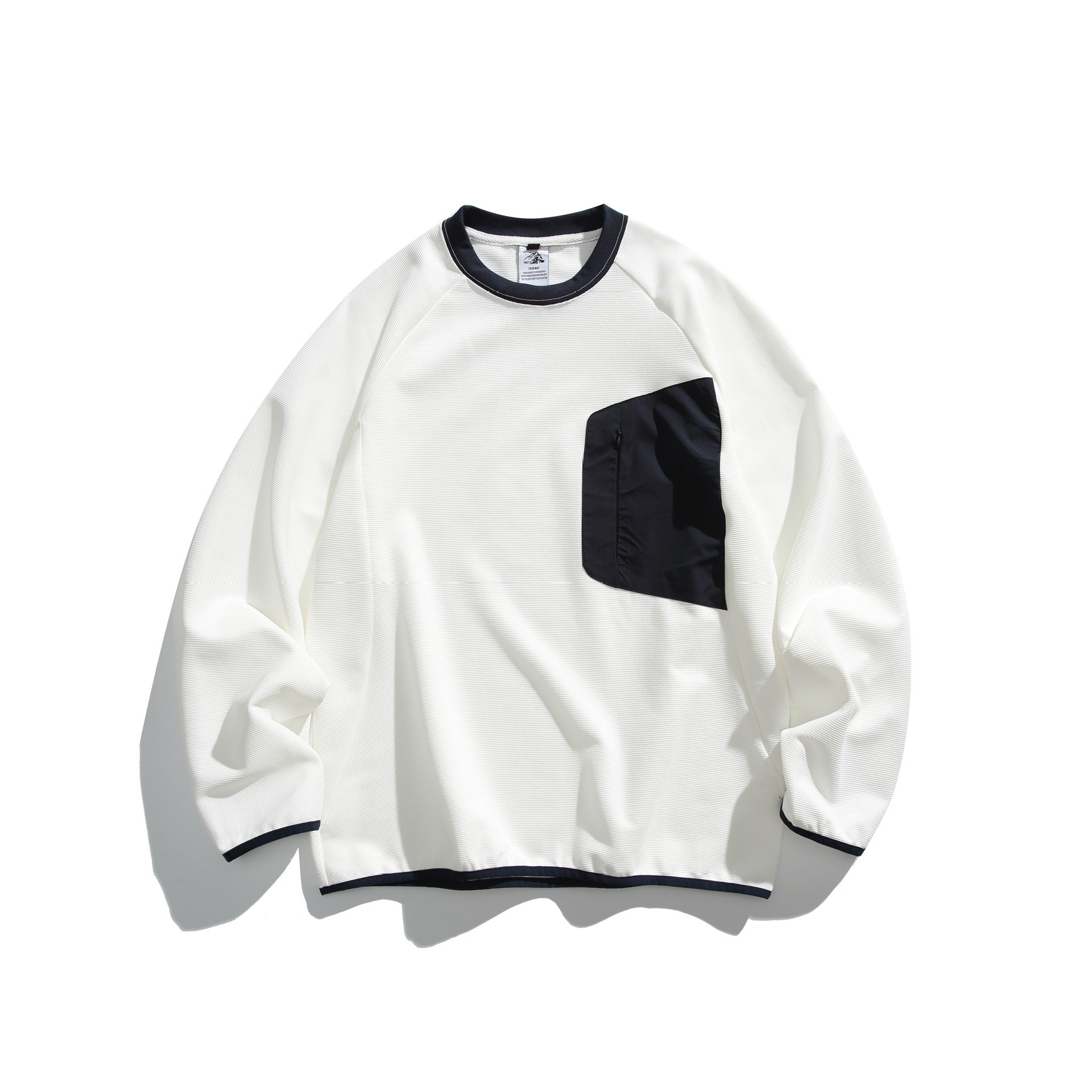 Unisex Boxy Sweatshirt with technical ribbed structure, applied zippered chest pocket and ribbed hem Chichicherry