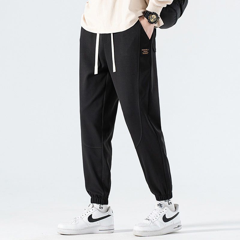 Men's Loose Fit Jogging Pants with Drawstring, Elastic Waistband and Sewn Knee Areas Chichicherry