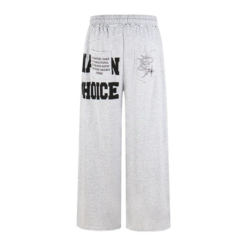 Women's Wide Palazzo Sweatpants with Comfort Waistband, Application Pockets and Typo Print Chichicherry