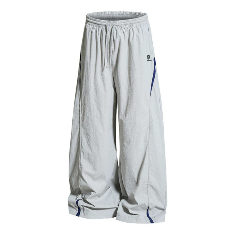 Women Wide Nylon Palazzo Training Pants with Drawstring, Side Contrast Triangles and Adjustable Hem Chichicherry