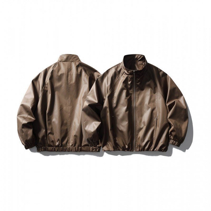 Men's short cut faux leather bomber jacket with stand-up collar, raglan sleeves, and elastic hem Chichicherry