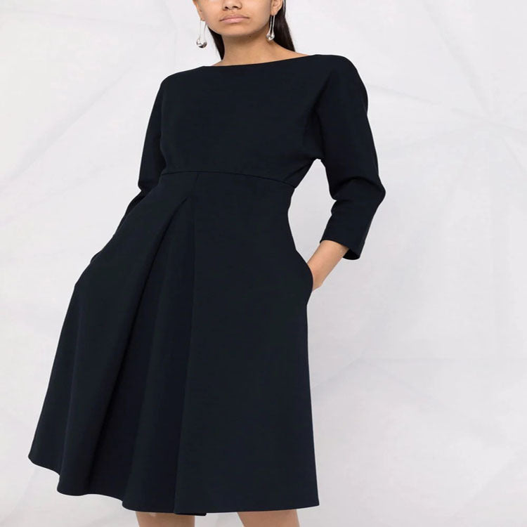 Women's dress with 3/4 sleeves, boat neckline and tailored pleated skirt Chichicherry