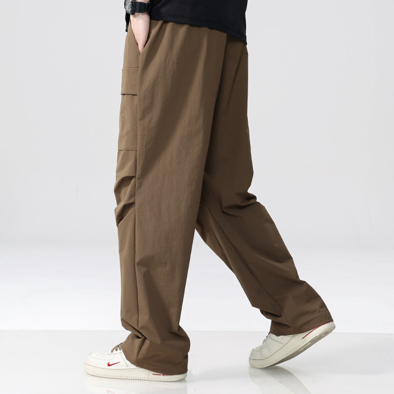 Men's Oversized Cargo Pants made of lightweight functional fabric with drawstring waistband and multiple pockets Chichicherry