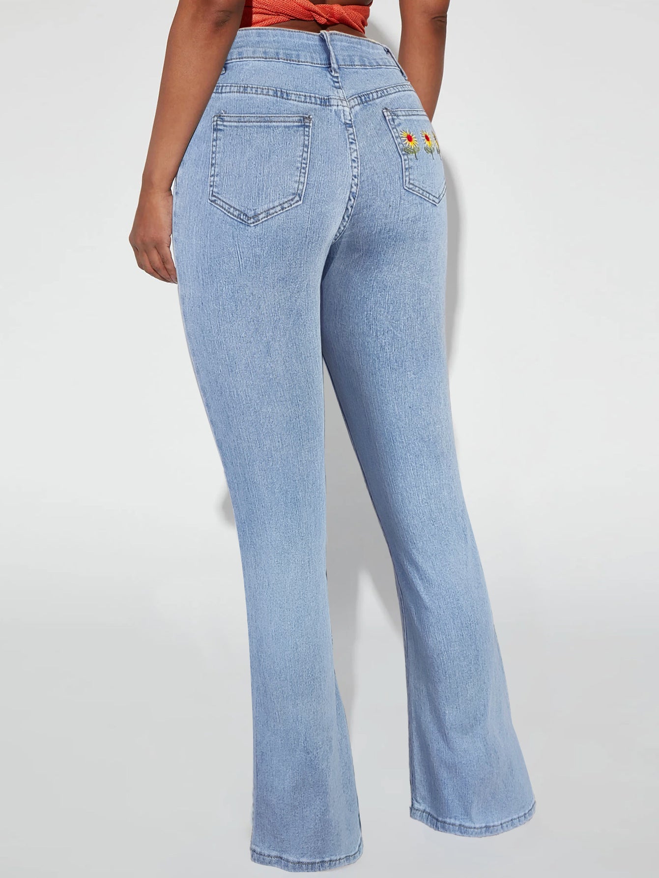 Women's high-waisted flared jeans with daisy embroidery and shaping cut Chichicherry