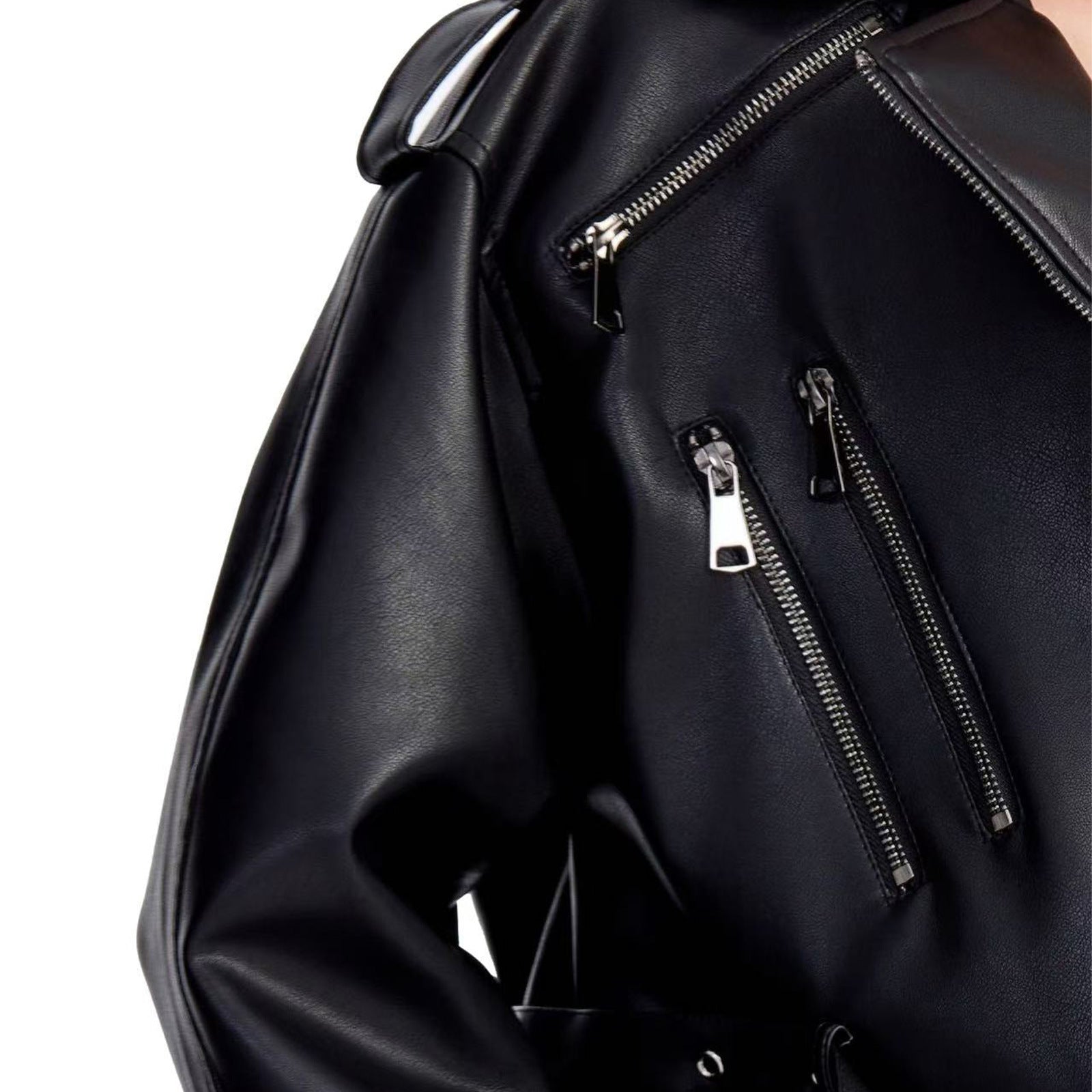 Ladies short fitted biker jacket made of faux leather with double waist belt, epaulettes and zipper details Chichicherry