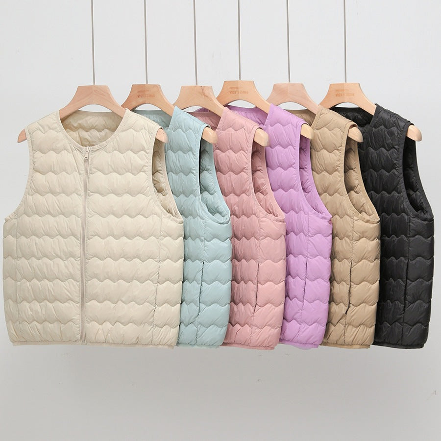 Women's lightweight padded vest without sleeves with zipper and wave quilting Chichicherry