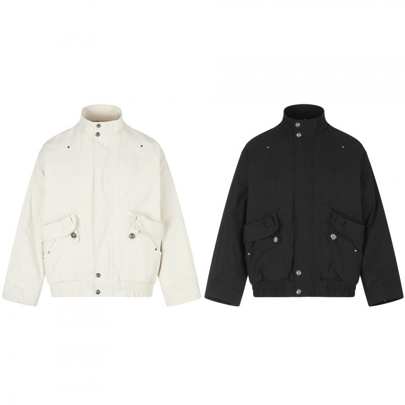 Unisex short jacket in boxy cut with stand-up collar, patch pockets, and elastic hem Chichicherry
