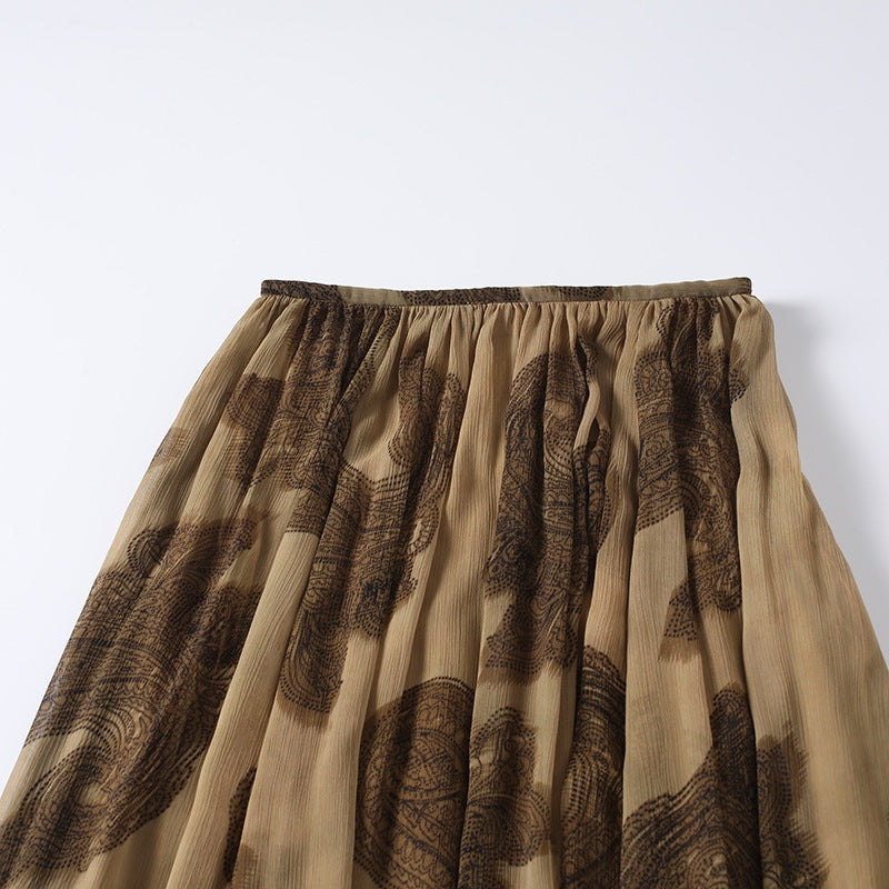Women's maxi skirt made of chiffon with pleats, elastic waistband, and ruffled hem Chichicherry