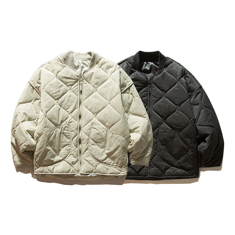 Unisex Lightweight Boxy Puffer Jacket with distinctive diamond quilting, front round pockets, and ribbed collar Chichicherry