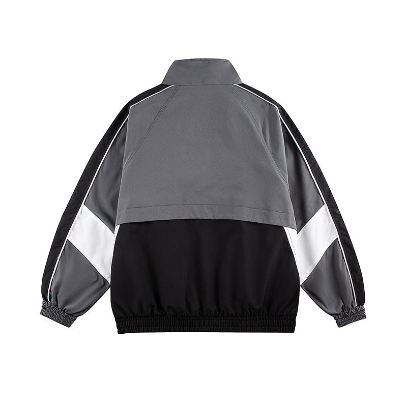 Unisex Classically Cut Track Jacket in Retro Sports Style with High Stand-Up Collar, Color Block Inserts and Elastic Hem Chichicherry