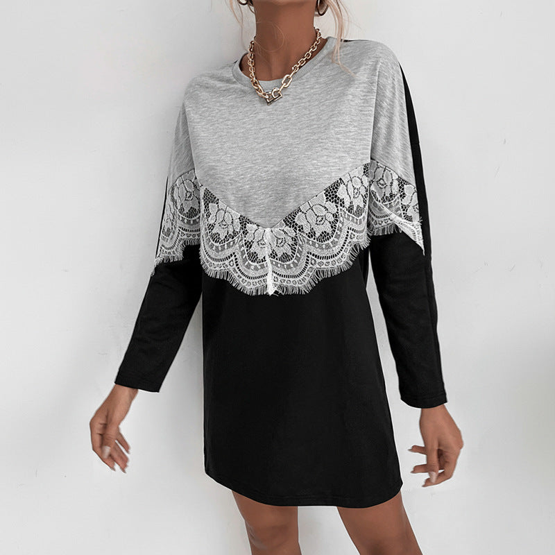 Ladies sweat dress in color block style with lace V yoke and rounded hem