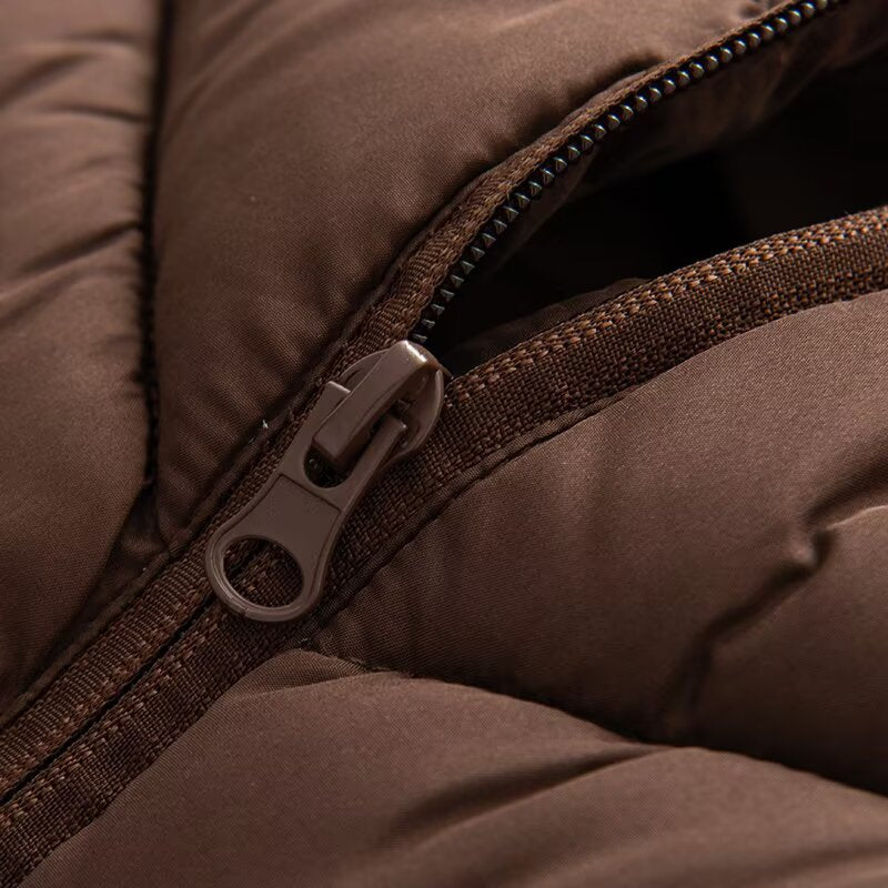 Women's hybrid quilted jacket with padding, hood, and elastic sleeve inserts Chichicherry