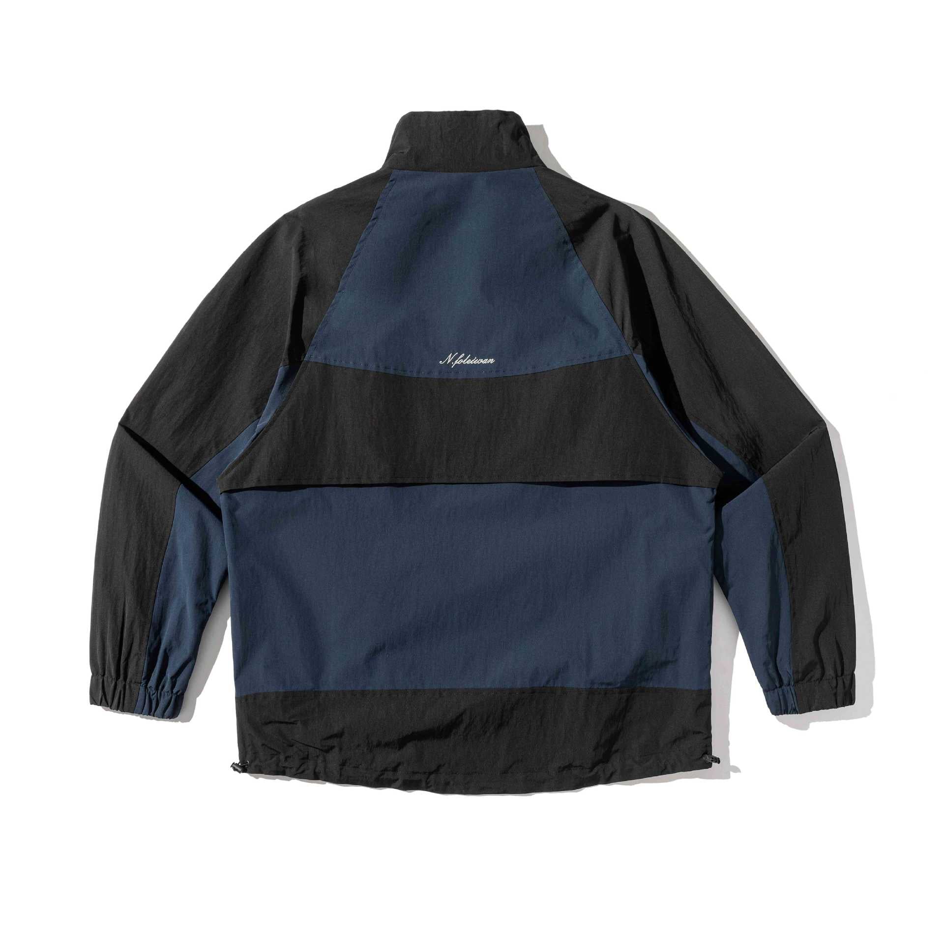 Unisex Lightweight Colorblock Windbreaker in Boxy Cut with High Stand-Up Collar and Drawstring Hem Chichicherry