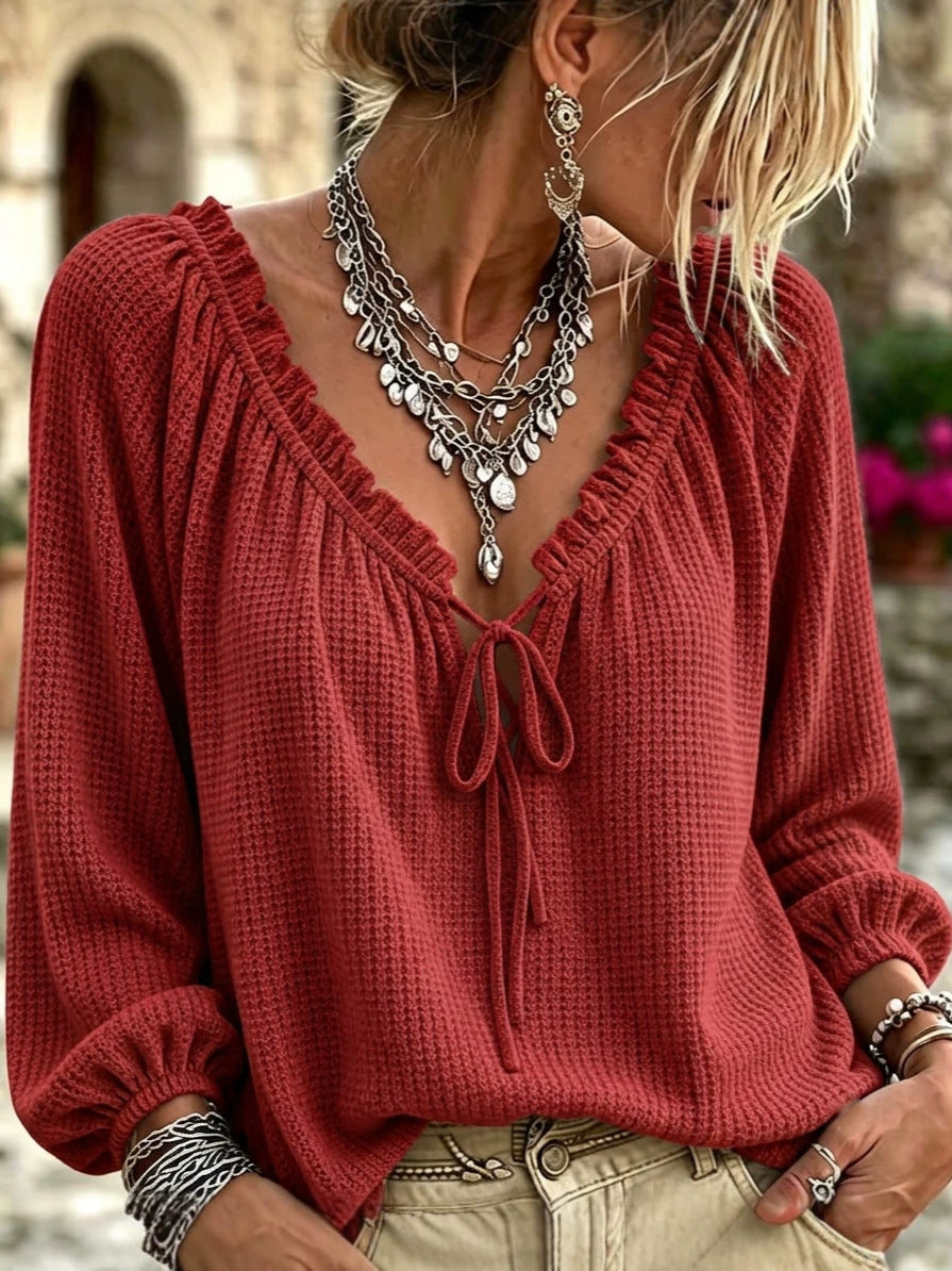 Women's waffle knit long sleeve with deep V-neck, ruffle trim and drawstring hood