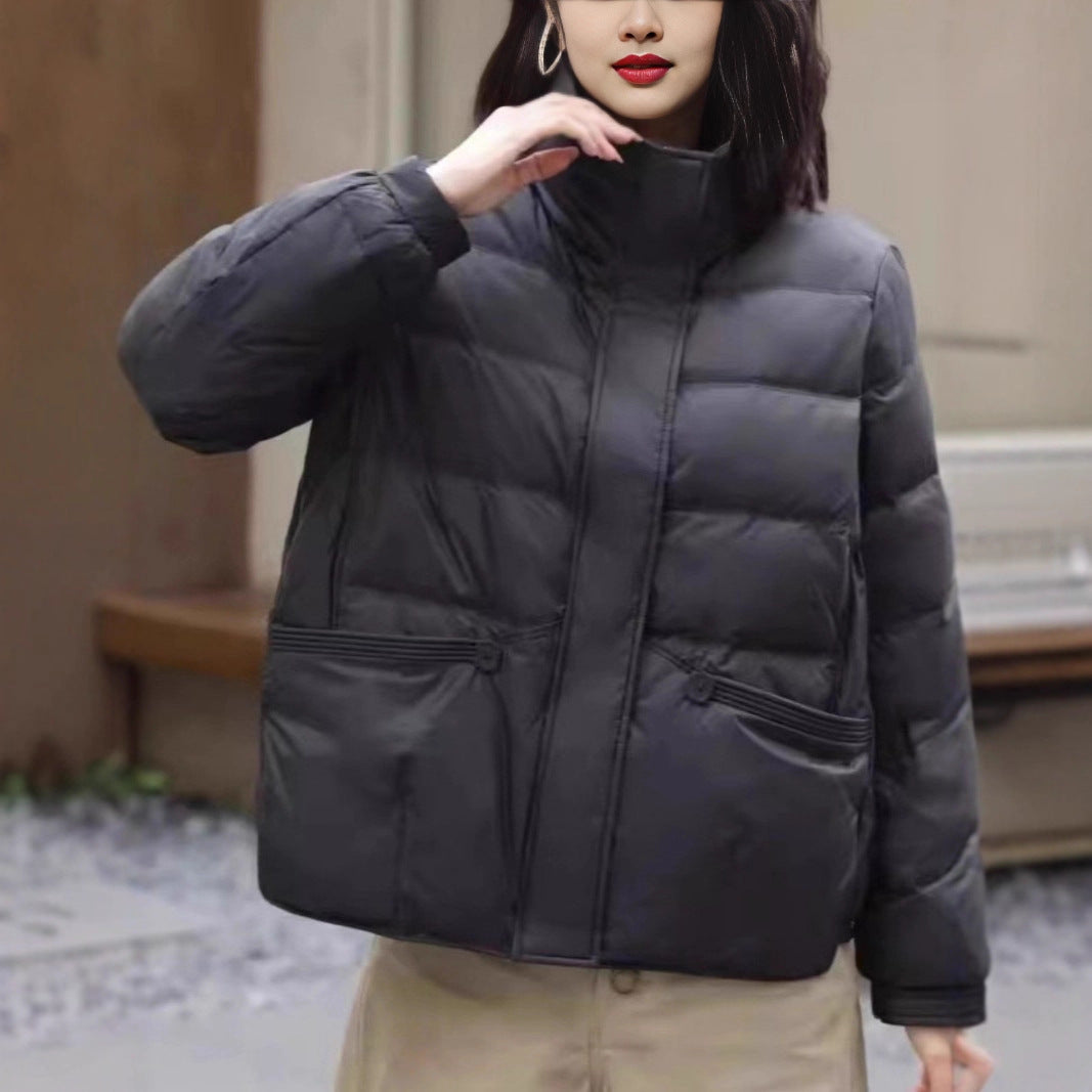 Women's short jacket quilted thermo puffer jacket with high stand-up collar and decorative button details Chichicherry