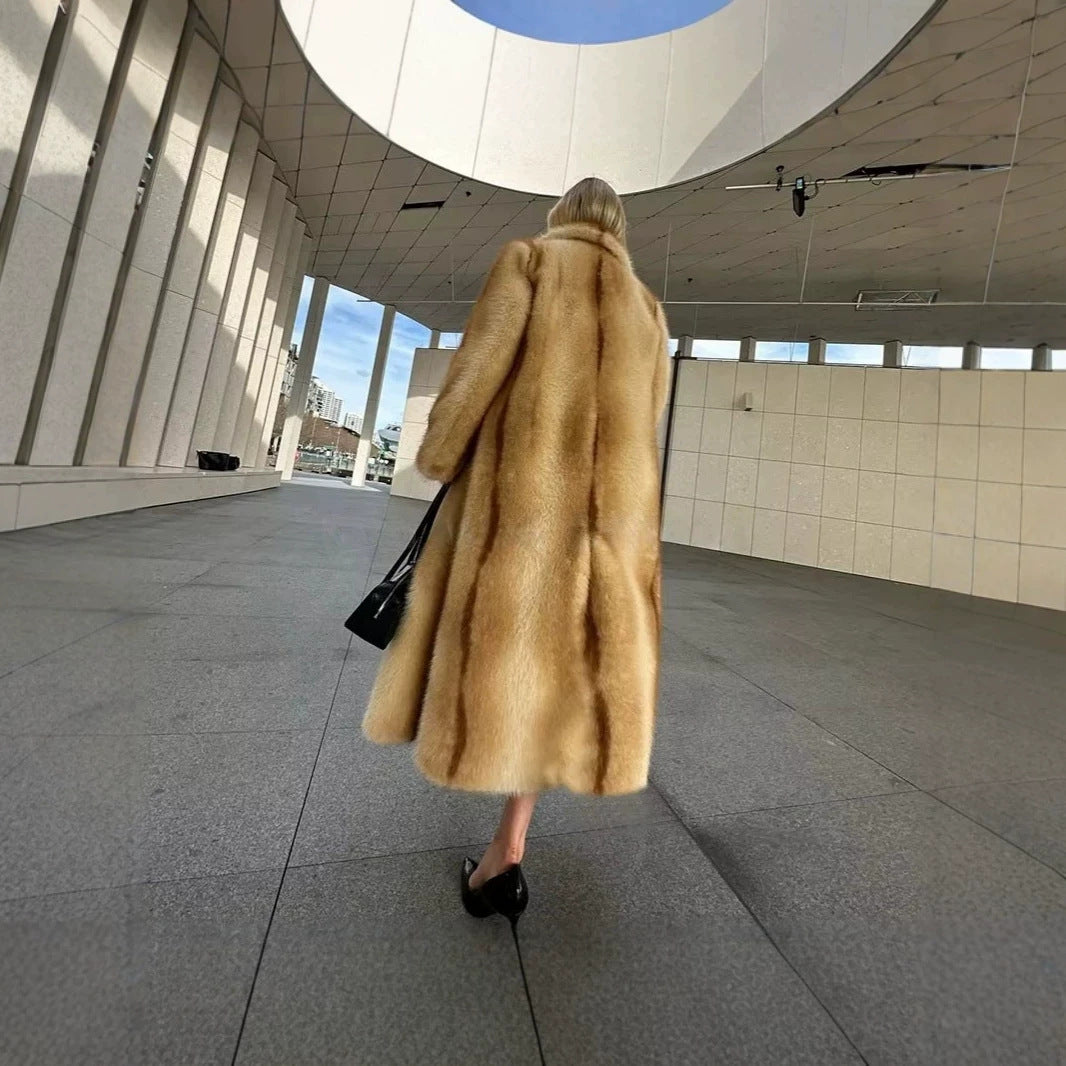 Women’s longer luxurious fur coat with wide lapels and concealed button placket Chichicherry