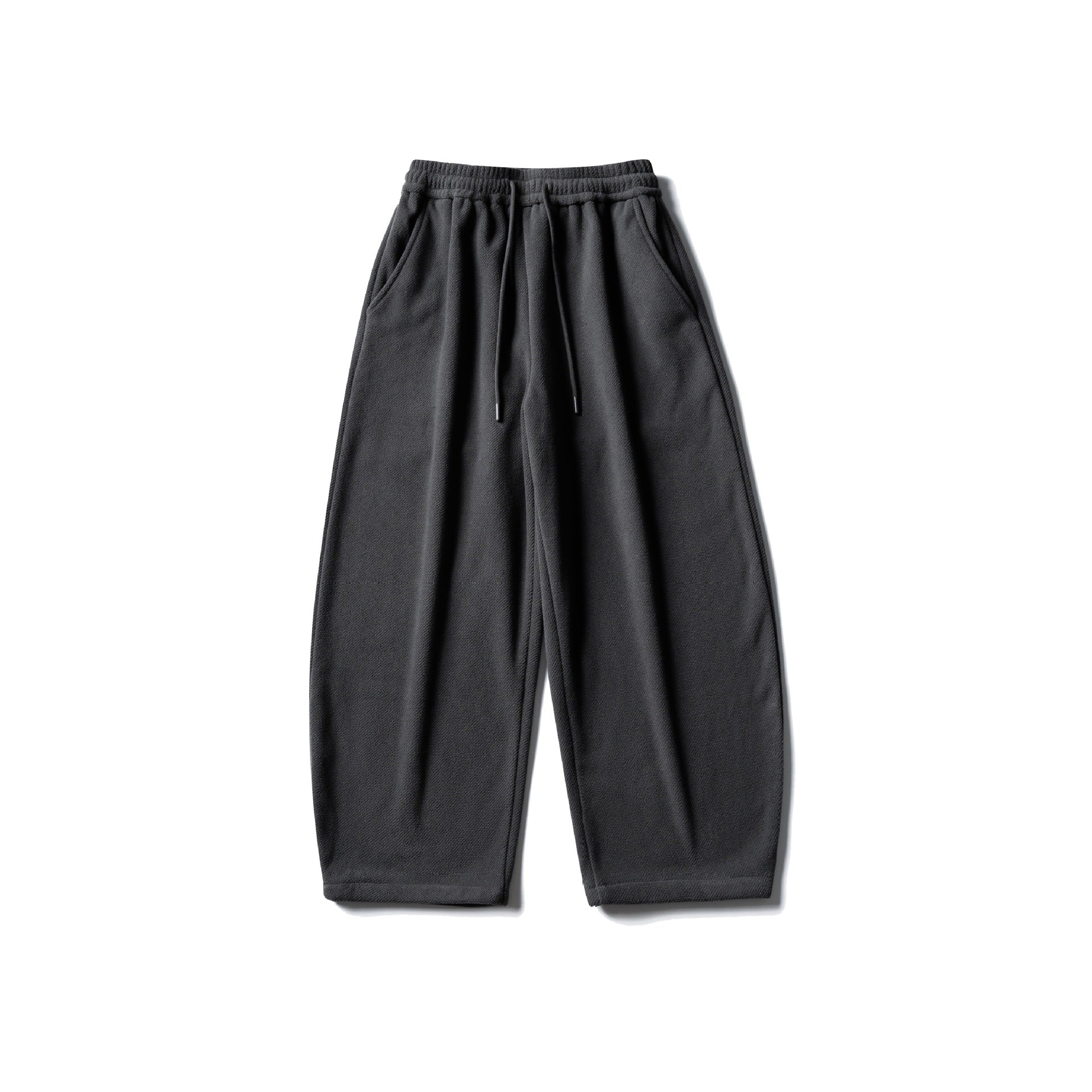 Unisex fleece jogging pants with elastic drawstring waistband, side pockets and tapered leg Chichicherry