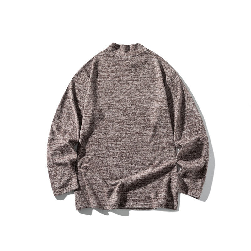 Unisex fine knit mock neck sweater with mottled structure and relaxed fit Chichicherry