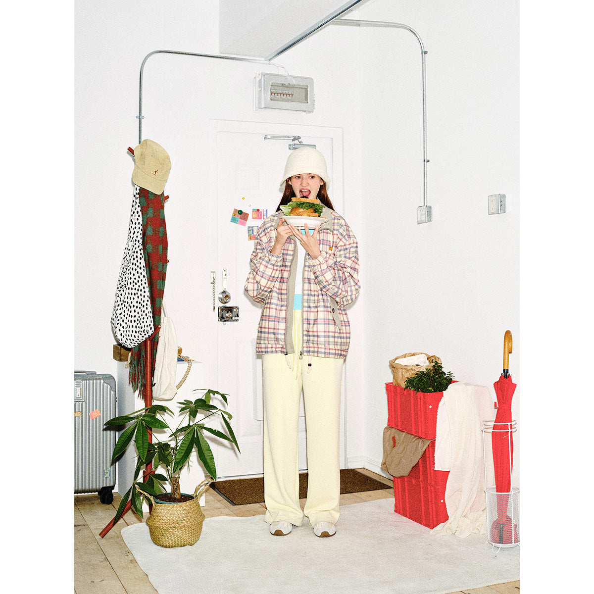 Women's lightly padded checkered boxy bomber jacket with drawstring hem, wooden bead cord and patch pockets Chichicherry