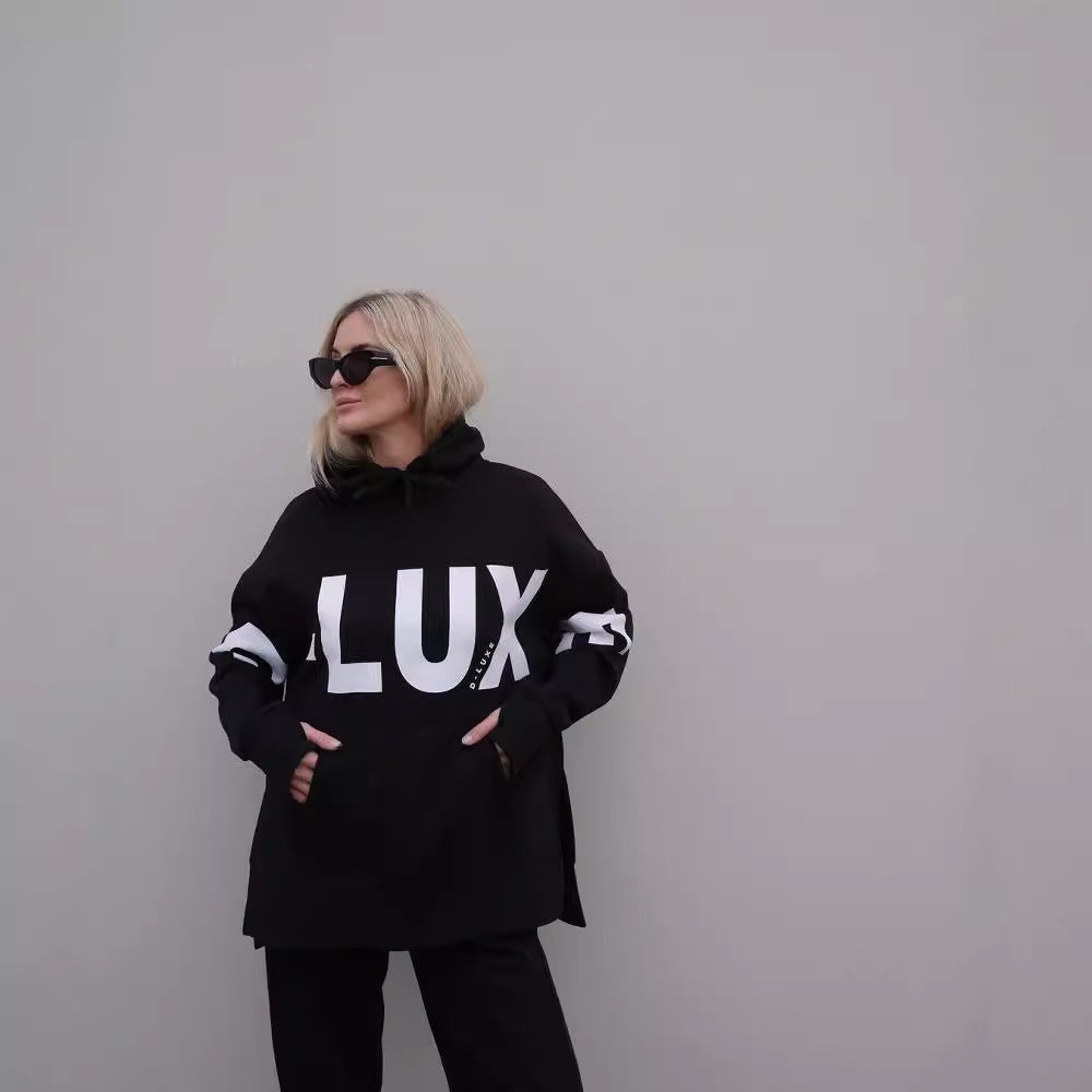 Damen Oversized Kapuzenpullover mit markantem Logoprint, Kängurutasche und Seitenschlitzen Chichicherry